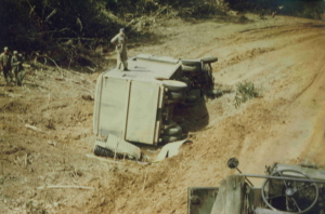 Burma Road_truck slides off muddy  road (2)