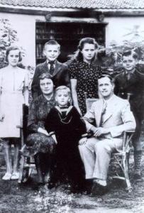 Taylor Family Reunion: Mary, age 13, Jamie, Kathleen, Johnny Taylor with their parents, Reverend James and Alice Taylor, in Fenghsian, China.  They were re-united 9/11/1945, after 5 1/2 years of separation.  Until their reunion, they had never seen their little brother Bertie, almost 5 years old.