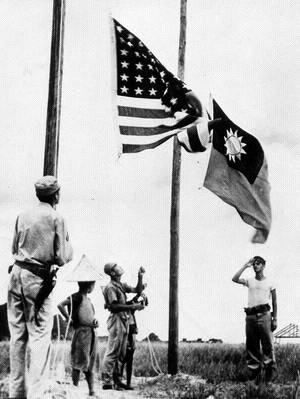 Flags raised over Luichow Barracks in 1945