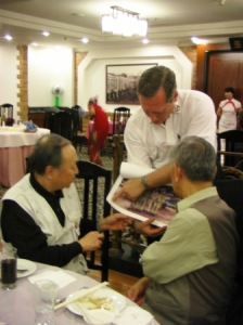 Fairwell dinner at Palace Hotel.  The owners of the jade shop were given copy #2 of the painting. "Keep them flying over CBI", signed by the Tiger tour group.